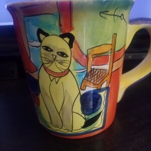 Artistic Cat Design Mug with Multicolor Accents